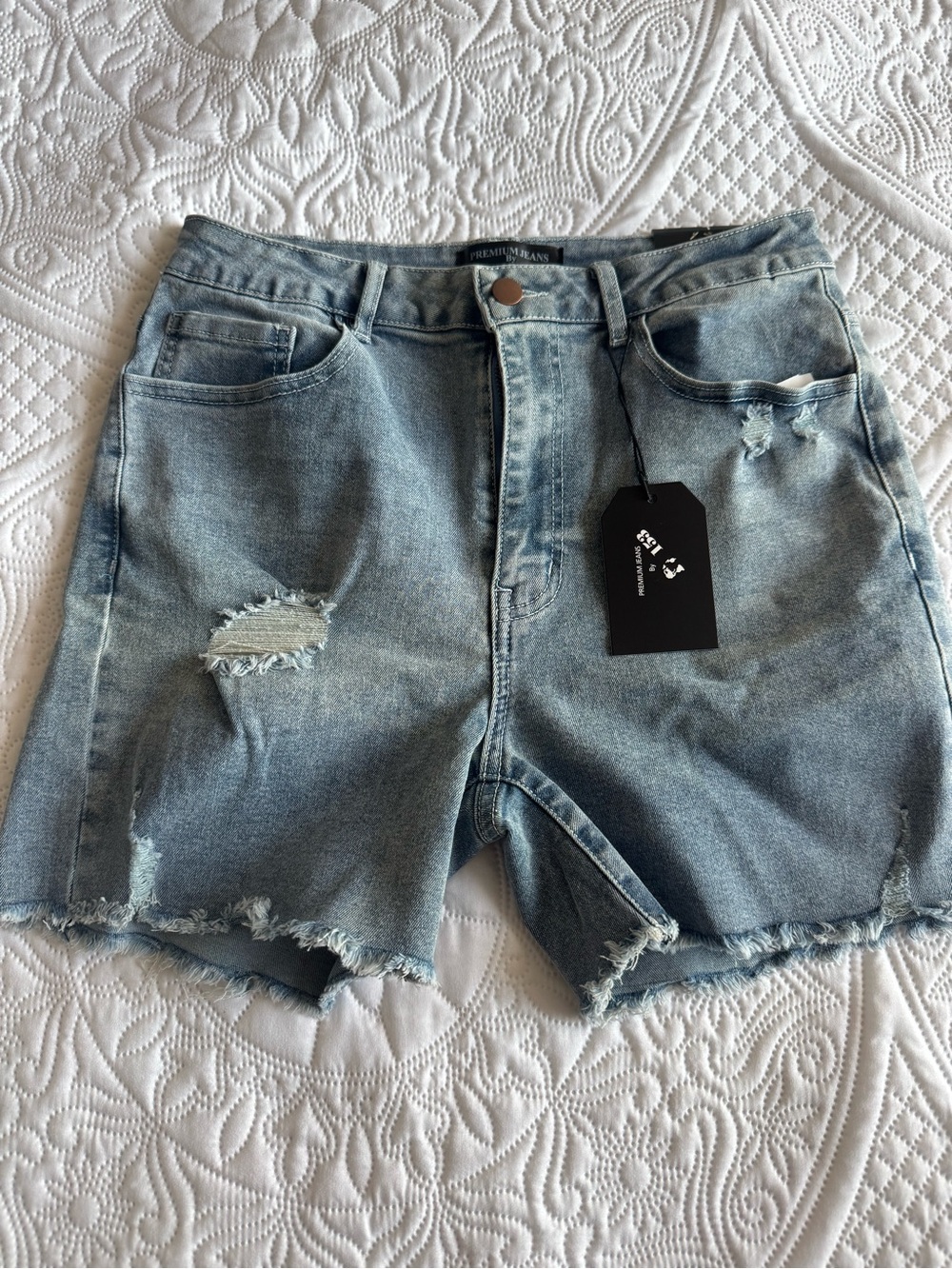 Women’s Light Blue Distressed Denim Shorts